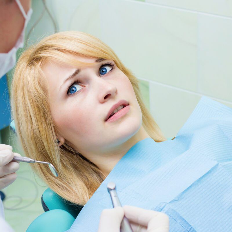 Woman displaying dental anxiety